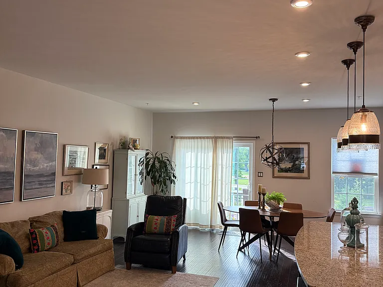 View from the kitchen countertop into the seating and dining area