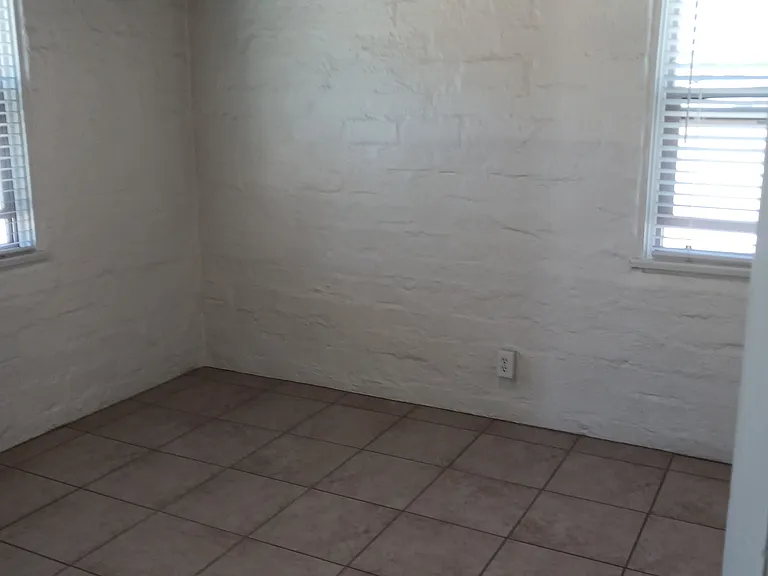 QUEEN SIZED BEDROOM WITH CEILING FAN & OPEN BEAM CEILING
