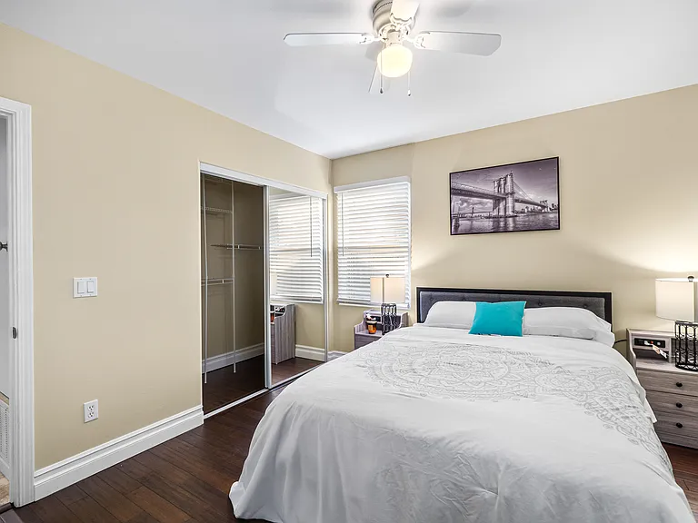 A cozy, clean bedroom designed for relaxation and a good night's sleep.
