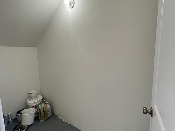 Large storage room inside the private garage of the townhouse