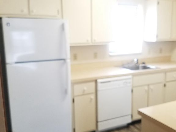 Kitchen (new fridge and flooring), dishwasher, garbage dispo