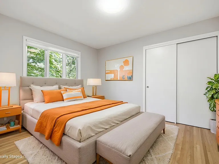Secondary bedroom, with two double closets. Virtual staging option 1