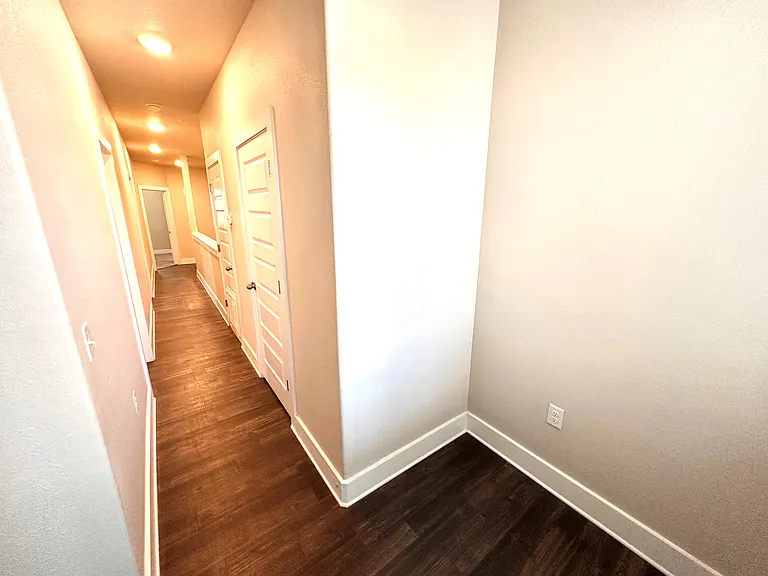 2nd Floor hallway with space to put a desk or table and featuring a large extra closet.