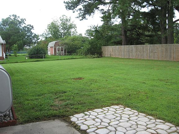Large fenced back yard.