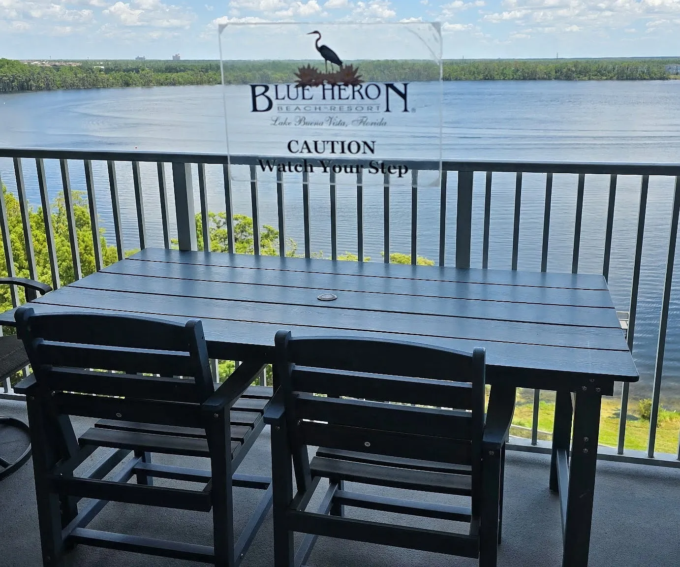 Balcony overlooking lake & pool