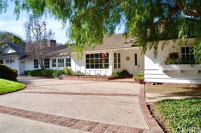 Welcome Home to the Cutest House on the Street! Circular Driveway and Full of Gracious Curb Appeal This 1957 Classic Equestrian Property awaits.
