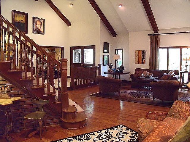 Open, flowing floorplan with beautiful hardwoods throughout