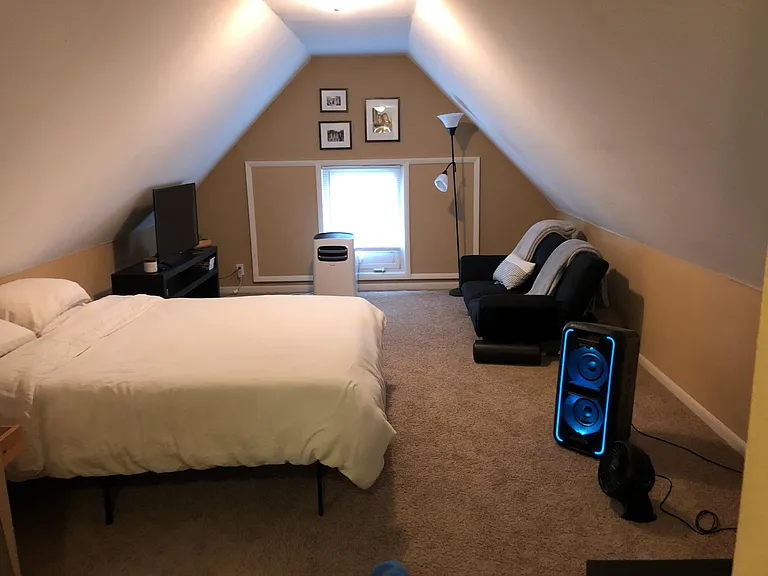 Bedroom #3. On the 3rd floor. Very large and private. Stairs are at the back of the apartment.