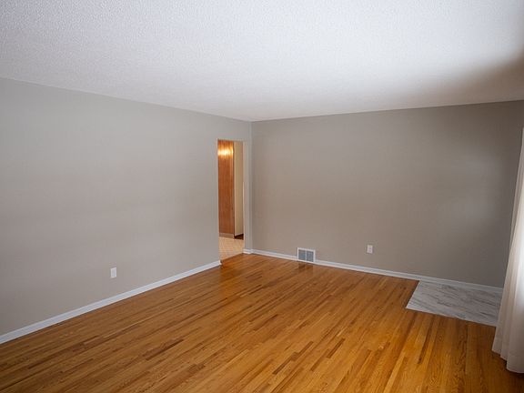 Livingroom view looking into dining room and hallway