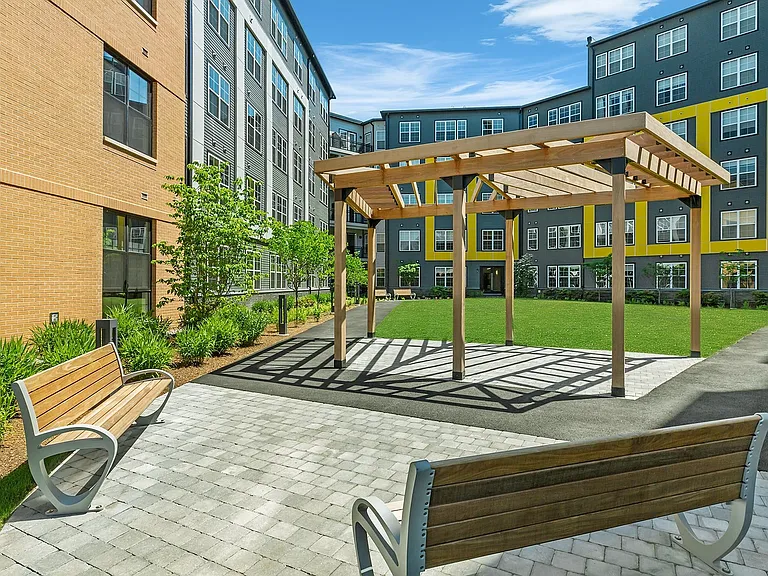 The outdoor living spaces are perfect for enjoyment with friends, family, and pets