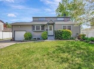 64 Circle Dr N, East Patchogue, NY 11772
