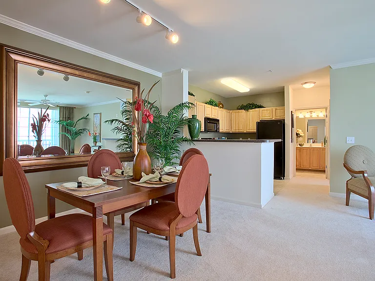 Apartment dining area and kitchen (staged)
