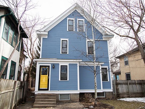 Back of the house with private, fenced-in backyard