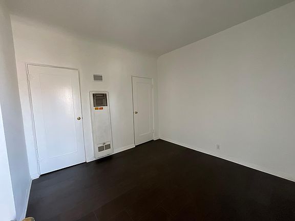 Living room entry with closet for storage