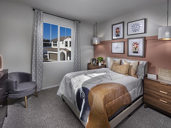 Residence 3 secondary bedroom modeled at a nearby Meritage community.