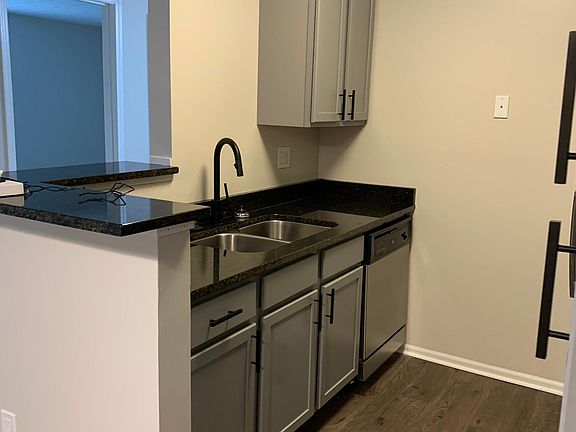 Garbage disposal and dishwasher inlcuded! Swan neck faucets and double basin sinks.