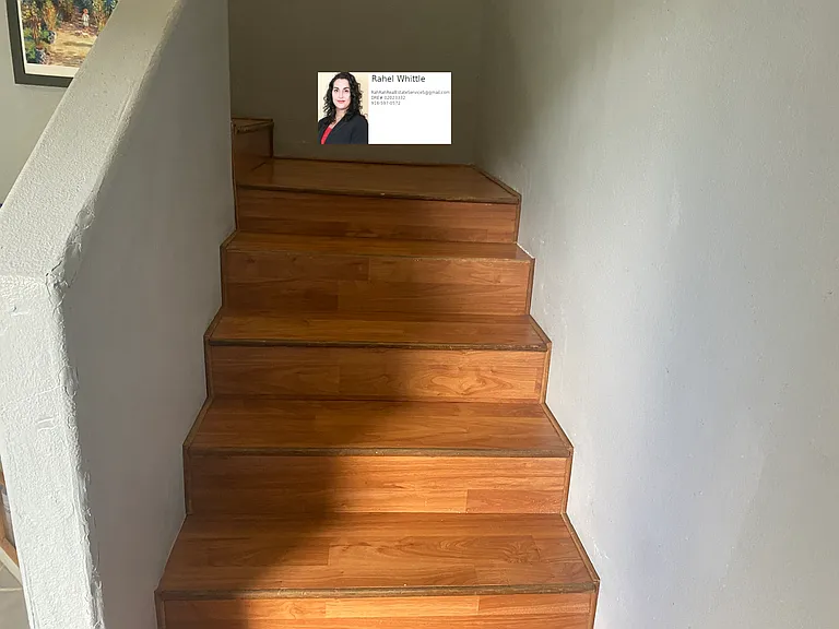 stairs leading up to large bedroom, loft, patio, and full restroom