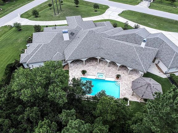Home sits beautifully on the corner of Ossineke and Whispering Maple Way. The Curb appeal is a car stopper.
