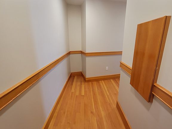 Walk into the apartment to a hall.