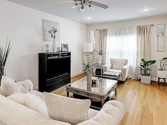 Gorgeous Living Room flows with natural light.