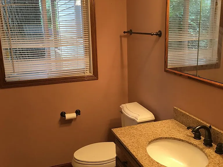 1st floor bathroom with shower directly across from 1st floor bedroom office/den. Must share with any tenants in the basement or if someone is on the 1st floor and needs ton use the restroom.