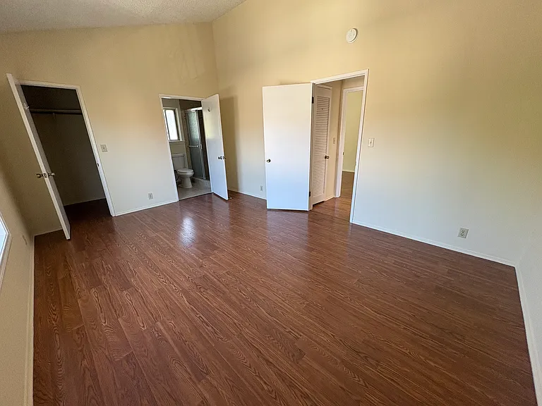 Huge bedroom with cathedral ceilings and private bathroom