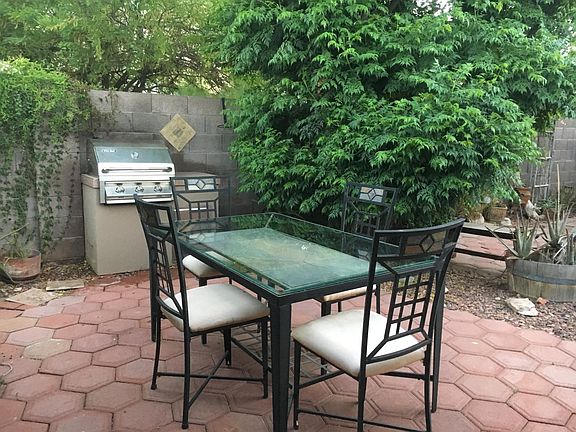 Shared BBQ and outdoor dining with the main house.