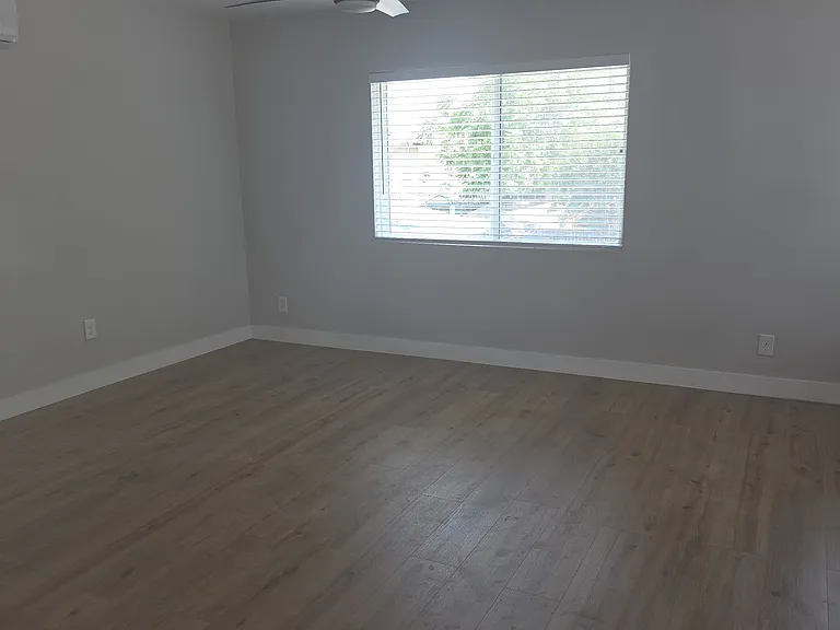 Spacious living room from kitchen view