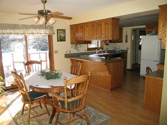 Open, bright kitchen with separate dining area