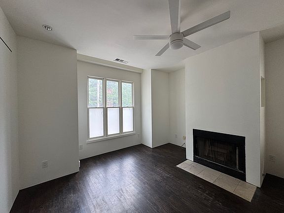 Living room with fireplace. Gas starter. Real wood. Beautiful light from the East.