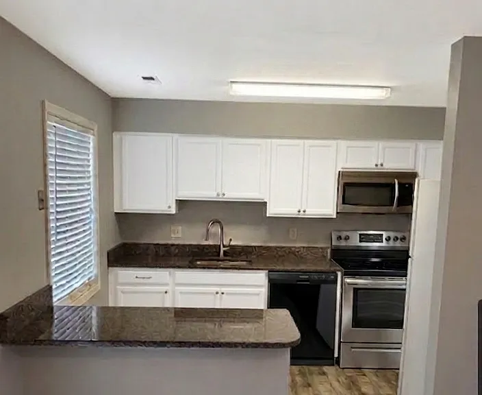 new stove and LVP floors