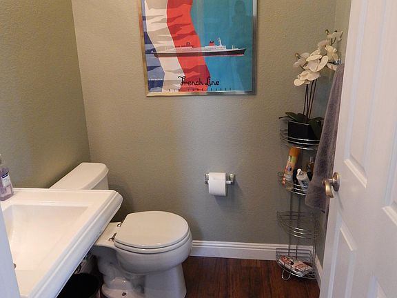 Downstairs half bath near staircase