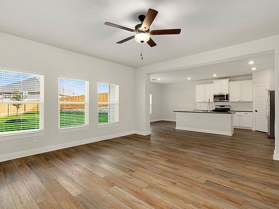 Open layout with the spacious living room connecting to the kitchen.