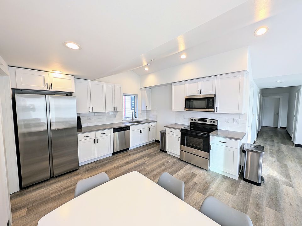 Kitchen comes furnished with pots, pans, silverware, cups/glasses, a toaster, air fryer, etc and has a dishwasher and stainless steel appliances.