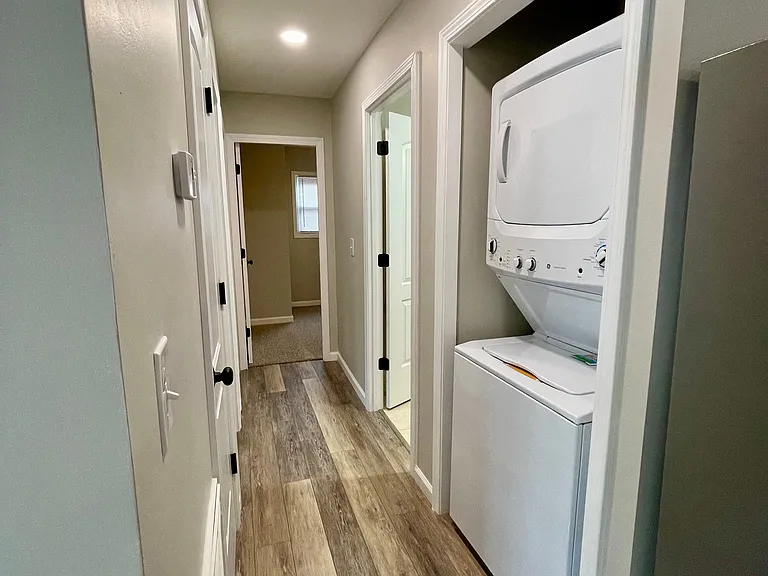 Hallway with washer and dryer