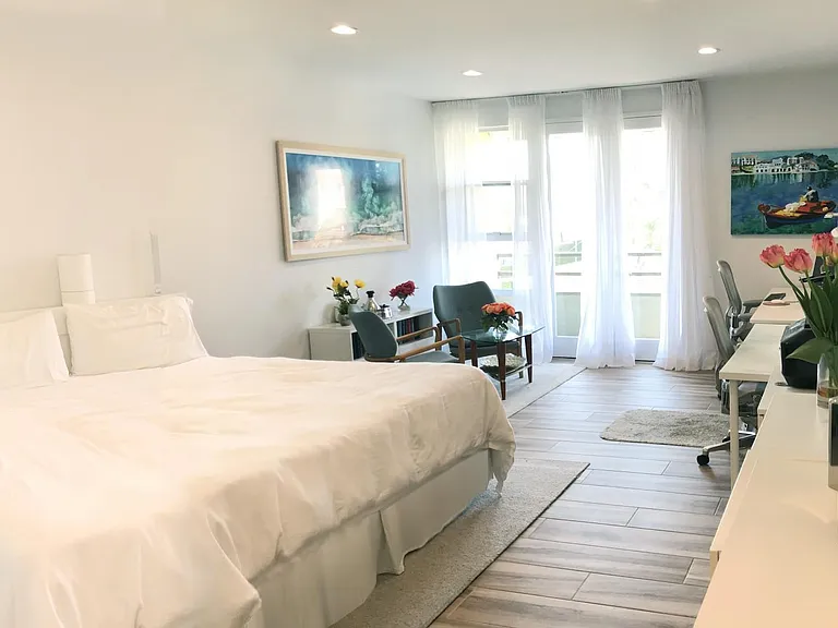 Master bedroom retreat with private sitting area/lounge and double office capacity.