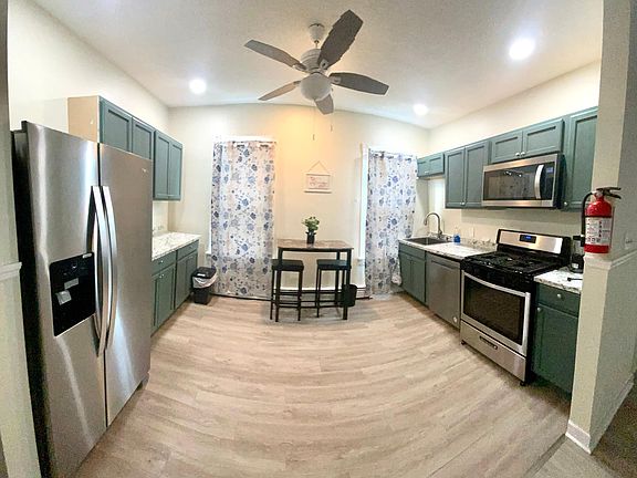 Brand new appliances including refrigerator, dishwasher, gas stove and microwave