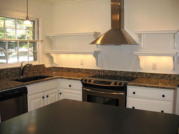 Kitchen with granite countertops and stainless steel appliances