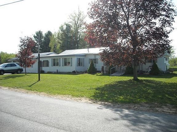 Front of home, large front and back yard.