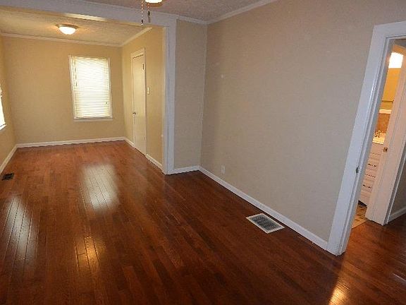 2nd bedroom with hardwoods and 2 closets