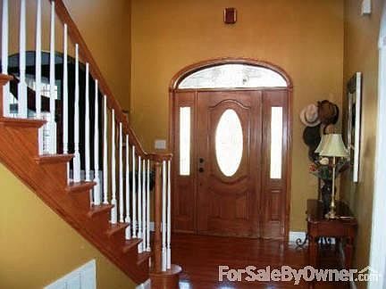 Foyer
						:
						Off of the foyer is an office and the formal dining room