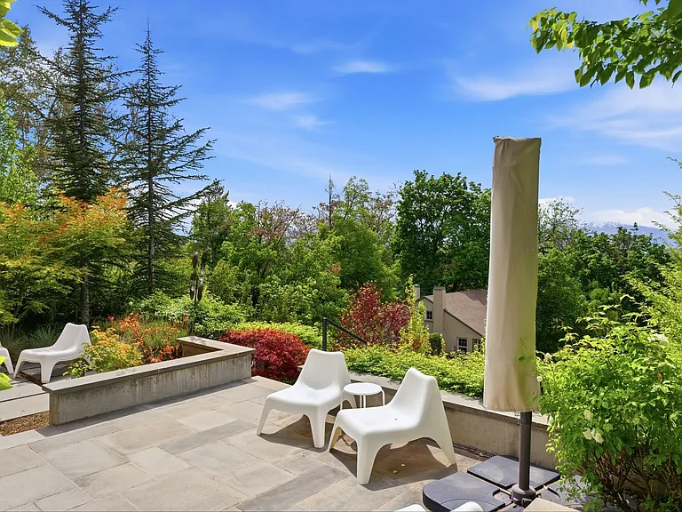 Enjoy mornings on your private front patio with city views.