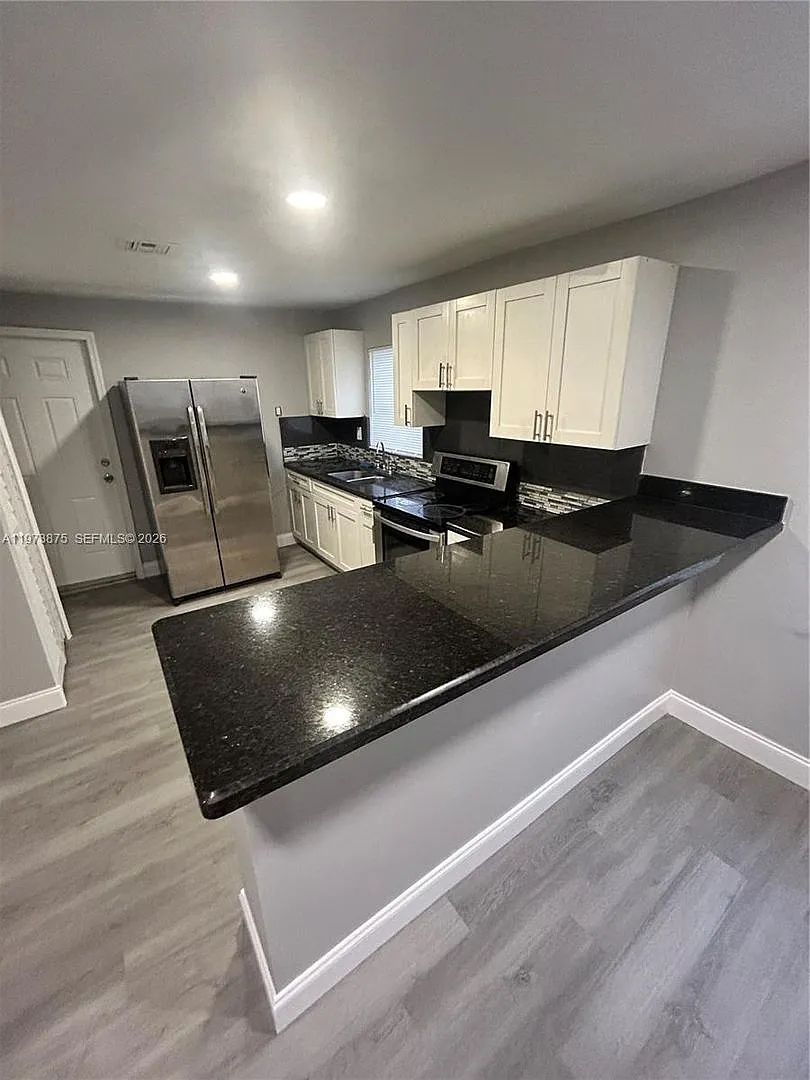 1036 NW 47th Terrace, Miami, FL 33127 — Photo 1