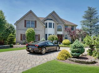 55 Molly Pitcher Dr, Manalapan, NJ 07726
