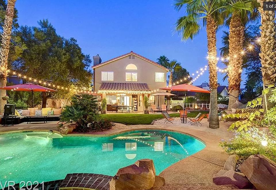 24 palms surround 3 distinct entertaining areas and the pool + spa