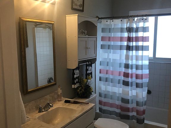 New Bathroom with storage closet.