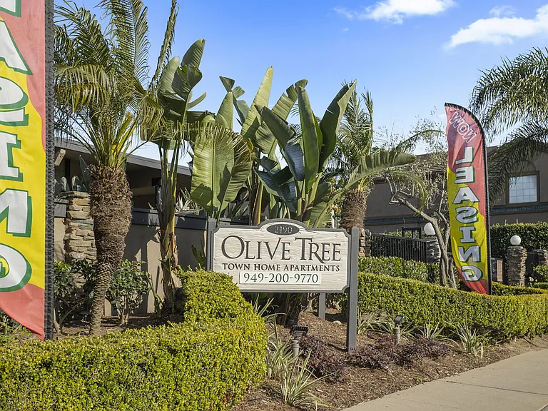 Property signage at Olive Tree Townhomes in Costa Mesa, CA