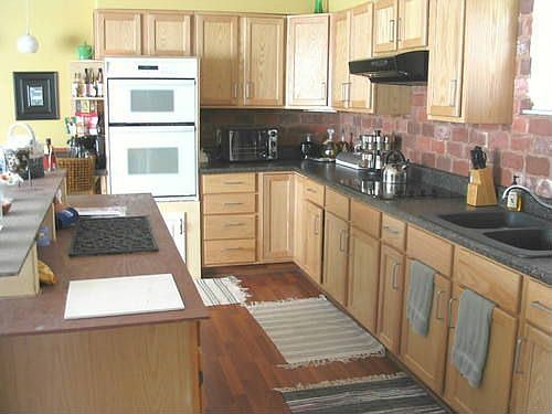 Remodeled kitchen with built-in appliances