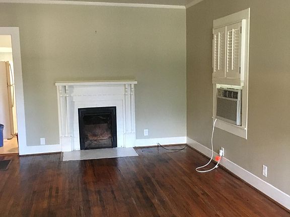 Main living room. House does not have central air. Has gas