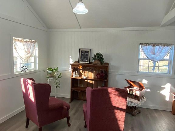 The living room is the heart of the home. This spacious room offers abundant light, making it a welcome gathering spot for entertaining guests. The heart of this home is designed with an open floor plan, which provides a flexible, versatile living space.